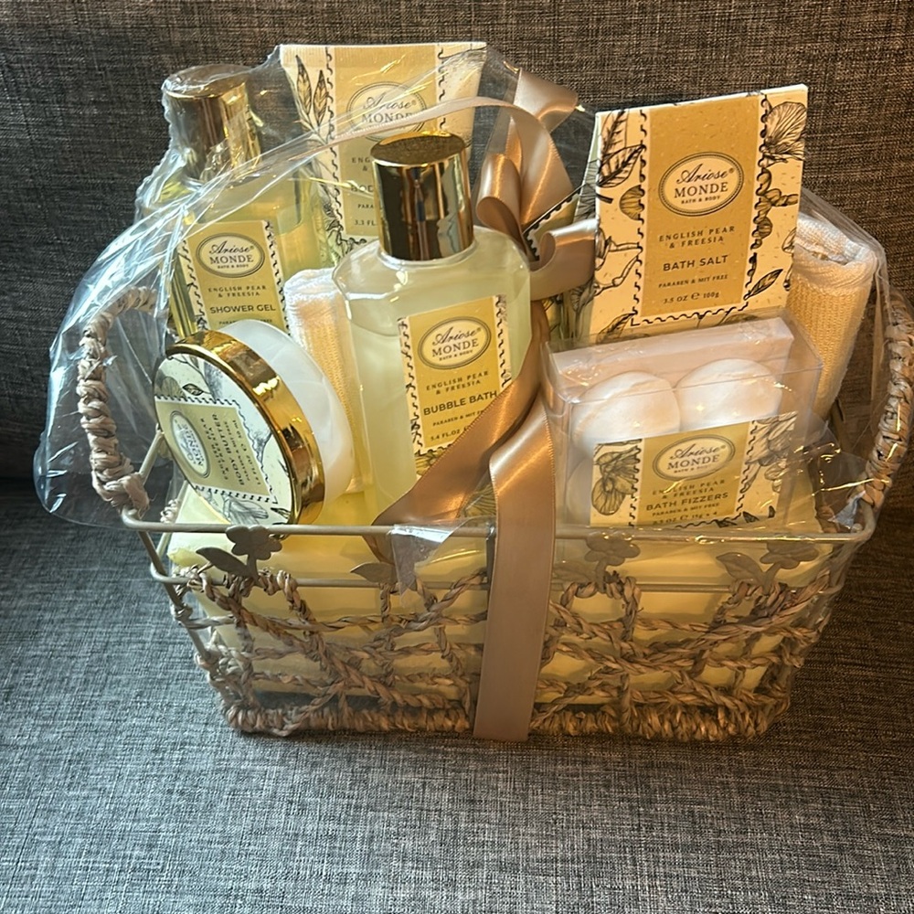 Beautiful new basket of bath and shower toiletries. Pear and Freesia scented.